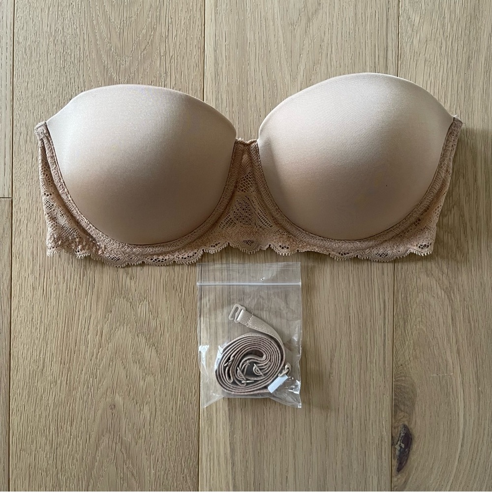 Calvin Klein Strapless Bra 36B w/ optional straps. Worn only once.  Like new.
